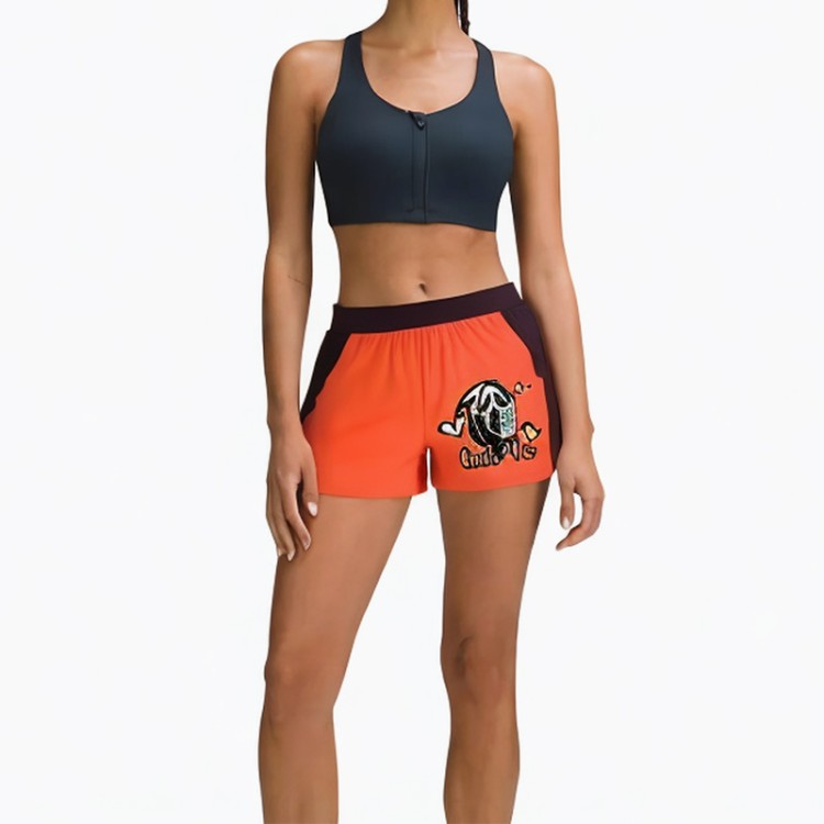 Orange high-waisted printed sports shorts